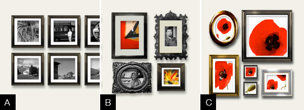Hang a group of pictures to fill up a large wall space